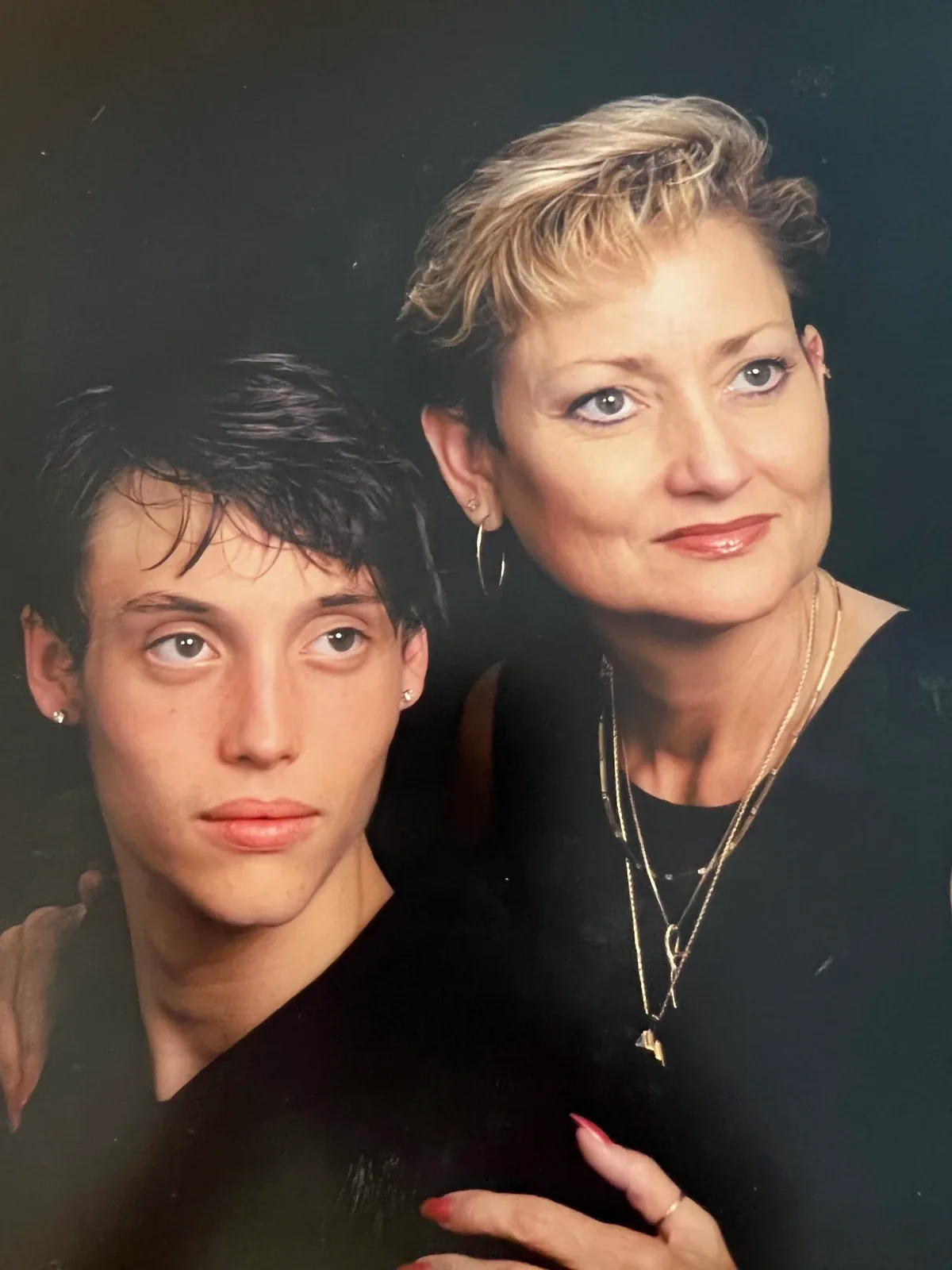 A studio portrait of Scott Hancock as a teenager, seated beside his mother, G.D. Hancock.